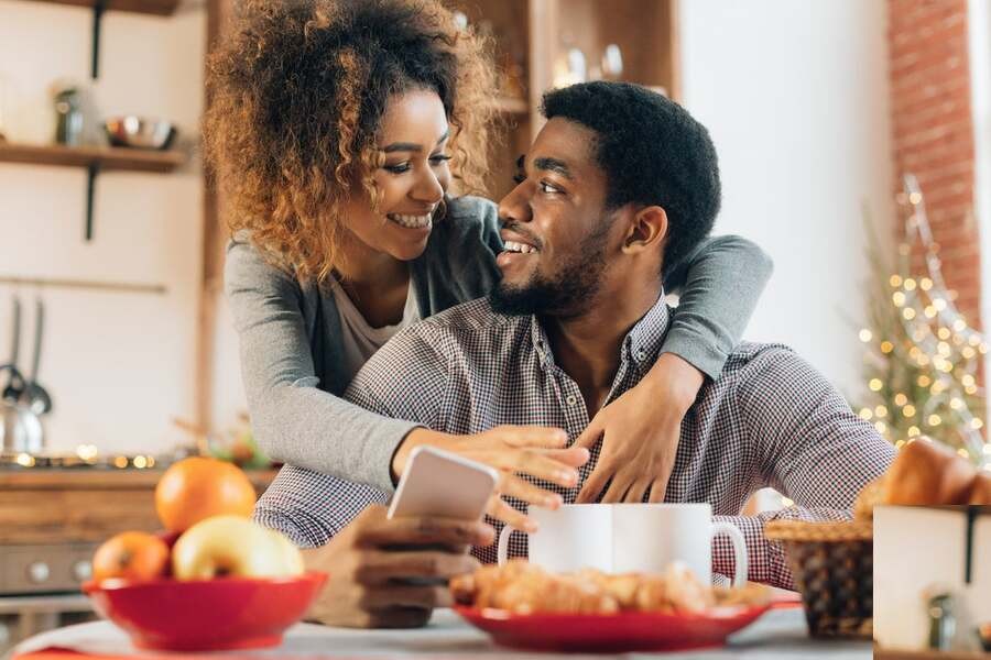 A couple staying warm inside during the winter season.